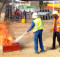 Petrus Thomas (right), founder and owner of BIC training, leads onsite training on industrial firefighting with Valleis Property and Renovation construction company in Khomasdal, September 2015.