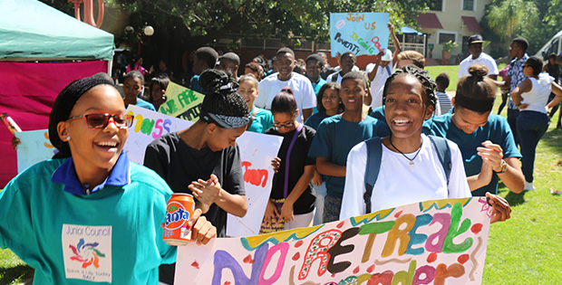 More youths on the march: In front are Junior Councillors Viloviah van Wyk (left) and Suzie Shefeni (right, in white).